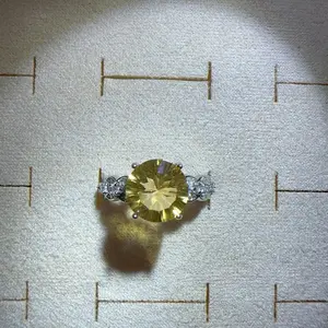<PingEast jewelry > Ring in 925 Sterling Silver Featuring a 10mm Round Natural Citrine with Millennium Cut
