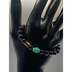 Taurus Zodiac black obsidian with aquamarine chalcedony semi precious stone/crystal elastic beaded bracelet with gold accents
