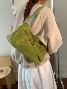 Suede Maillard-style retro underarm bag, a niche luxury handbag from the MIU line. A lightweight, luxurious design commuter tote bag for women. Zipper closure. Non-adjustable shoulder strap. Suitable for commuting, shopping, leisure travel, and daily acce