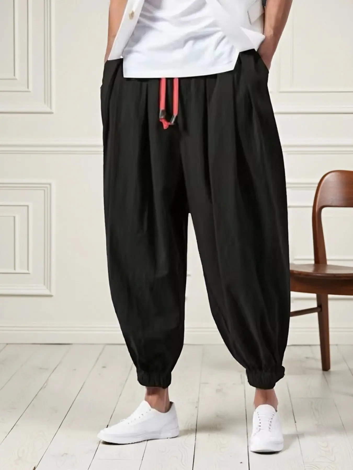 Men's fashionable, simple and casual solid drawstring pants, loose and sporty long pants, solid-color lantern pants style, suitable for comfortable daily wear, essential items in men's wardrobes