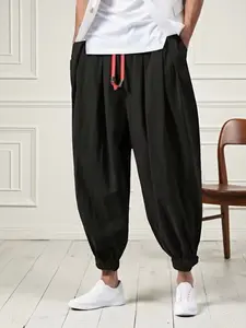 Men's fashionable, simple and casual pants, loose and sporty long pants, solid-color lantern pants style, suitable for comfortable daily wear, essential items in men's wardrobes