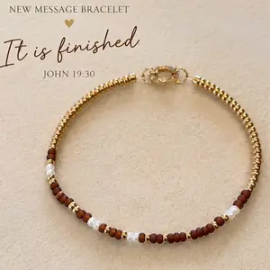 Morse Code Bracelet - “It is Finished” Japanese TOHO Glass brown, cream, and gold seed beads with gold carabiner clasp.