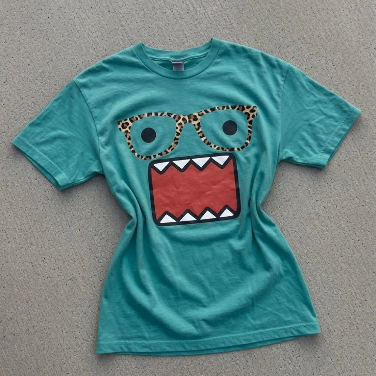 Kun T-shirt | Vintage Japanese Monster Leopard Glasses Graphic Tee, Retro Y2K Cute Mascot Teal Turquoise Shirt, Loose Fit Top