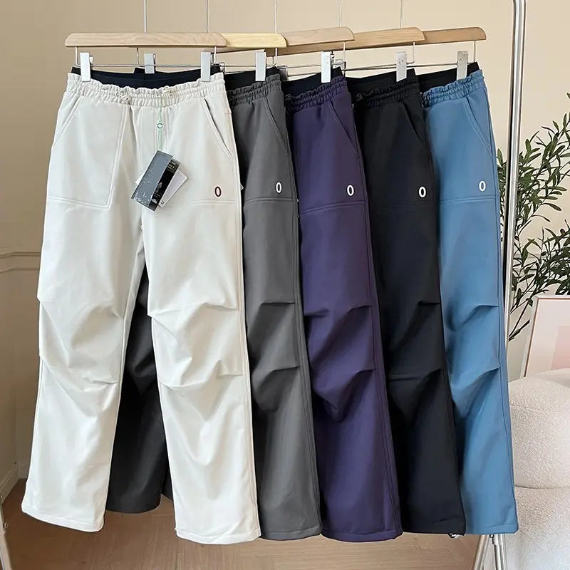 Fleece-Lined Softshell Pants Women's Winter Waterproof Insulated Cargo Pockets Elastic Fit Activewear Hiking Skiing Casual Bottoms Polyester Breathable Fabric for Cold Weather Adventures