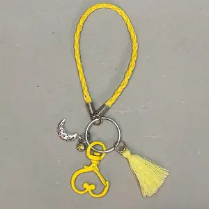 Yellow Keychain with Cute Charms and Rhinestone Embellishments