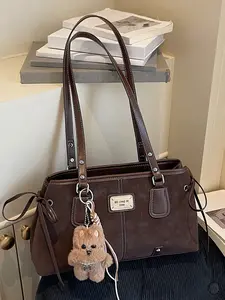 Gentle texture retro light luxury tote bag, exquisite atmosphere casual versatile shoulder bag, large capacity design, with cute plush pendant decoration, suitable for parties, commuting to and from work