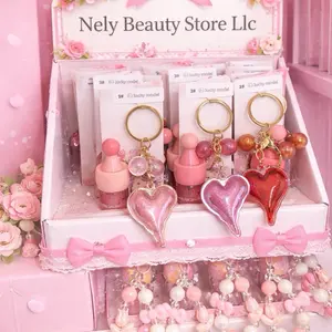Nely Beauty Store Llc NB 12 pcs Lips Gloss Mixed with Heart Charms and Bow Accents for Stylish Makeup