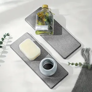 2pcs matte, straight-edged stone-based, diatomaceous earth platform mat, simple and elegant in design. The diatomaceous earth material is highly absorbent and dries quickly, making it suitable for use in bathrooms, kitchens, coffee tables,