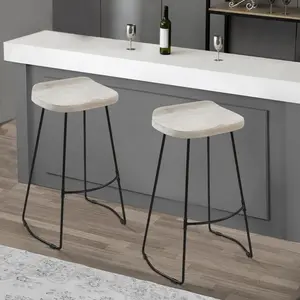 Tiva 30 Inch Handcrafted Backless Barstool, Whitewashed Mango Wood Saddle Seat, Black Metal Base By The Urban Port