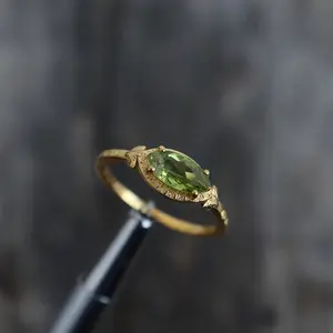 Vintage bohemian style green stone ring, set with marquise-cut olive green synthetic zircon, a nature-inspired handmade-inspired ring, a simple and vintage engagement ring, an exquisite stackable jewelry piece, a anniversary gift for her.