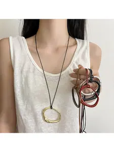Minimalist geometric irregular pendant leather cord necklace for women, long adjustable versatile statement chain.