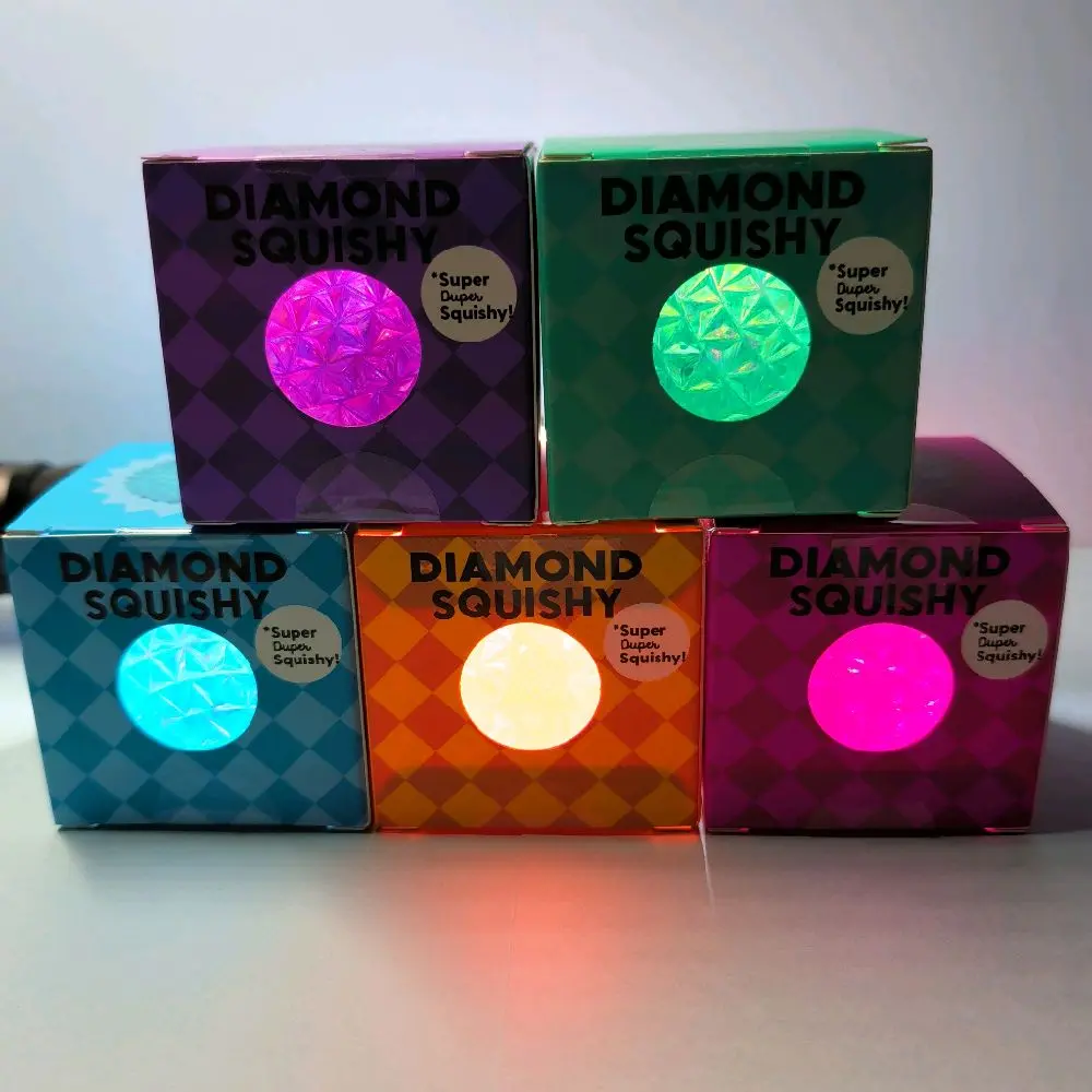 J'ADORE!!  DIAMOND SQUISHY!! VARIETY OF COLORS, FOR AGES 3+ GREAT FOR STRESS RELIEF!!