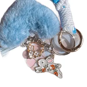 Personalized Macrame Heart Poof Keychain with Bunny Charms. Spread the love—one poofy heart at a time!