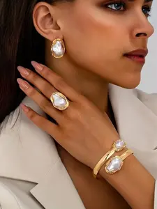Three-piece vintage faux pearl ring and earring set, elegant jewelry set, stylish jewelry design, perfect for summer fashion.