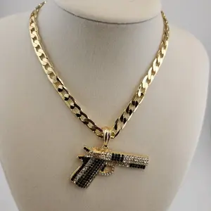 13 - G. U. N. Pendant and Chain 7mm 24 Inches 14k Gold Laminate with Rhinestone Gun Design