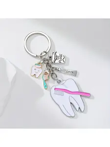 1 tooth keychain with toothpaste, floss, toothbrush and toothpaste pendant, bag, purse, luggage accessories, ideal for dental office souvenirs
