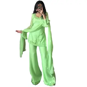 Handowork 90’s Style Green Kurtha Set   Vibrant green with intricate handwork, bringing back that classic 90s desi charm. Flowy, elegant, and perfect for festive occasions or special gatherings