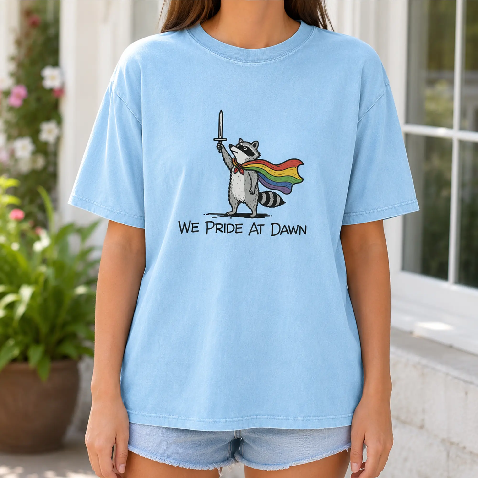 We Pride At Dawn Shirt, Funny Raccoon Pride Comfort Colors T-Shirt, LGBTQ Pride Graphic Tee, Rainbow Cape Shirt
