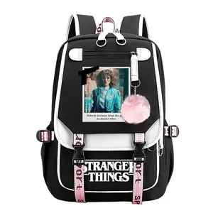 Stranger Things Nancy Wheeler Trendy Youth Laptop Backpack,11.4''×18.1'' Large Capacity Multi Pocket School Bag with Pom Pom Charm, Adjustable Breathable Straps Perfect Back To School Gift