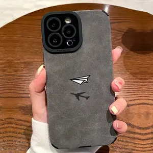 This phone case features a paper airplane reflection design and is made of high-quality faux leather with a suede-like texture. It's compatible with iPhone 17, 16, 15, 14, 13, 12, 11, XS, X series, and makes a great gift for friends or family.