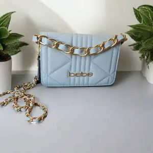 bebe Gia Crossbody bag. color: blue light