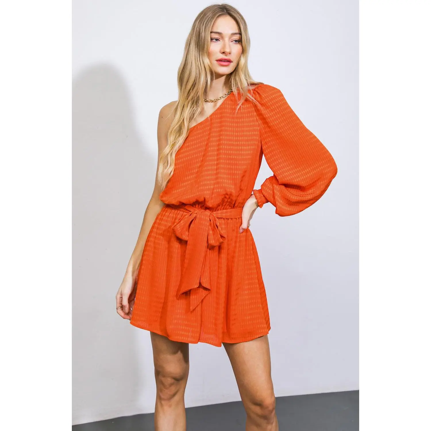 UNEXPECTED SURPRISE WOVEN ROMPER