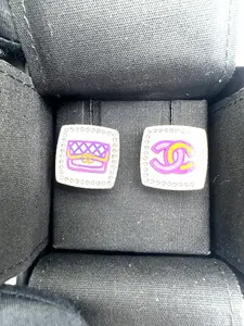 Pre-owned Chanel 24C Resin Crystal CC Logo & Flap Bag Asymmetrical Stud Earrings IRIS104