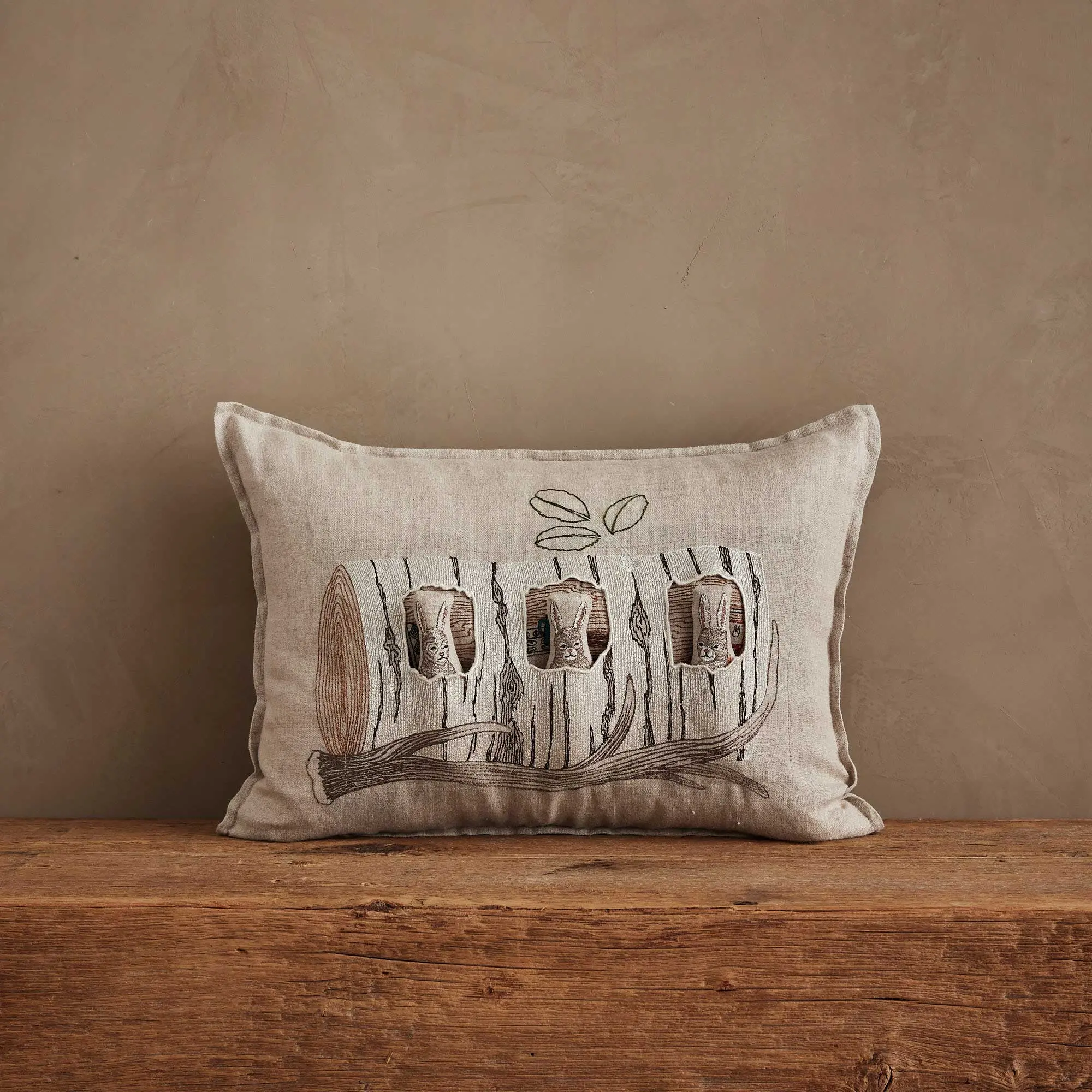 Aspen Log Bunnies Pocket Pillow