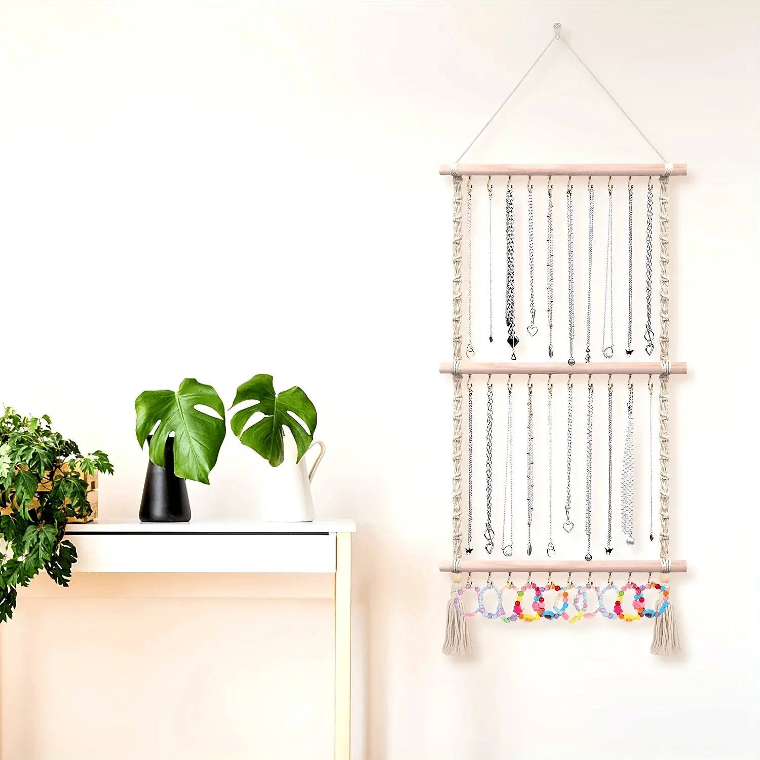 Hanging jewelry storage bag, equipped with a braided necklace rack and hook, used for wall-mounted jewelry storage, Hangable Storage