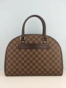 Pre-owned Damier coated canvas with smooth chocolate leather trim Clutches & Wristlets Louis Vuitton Brown Damier Ebene Nolita Handbag