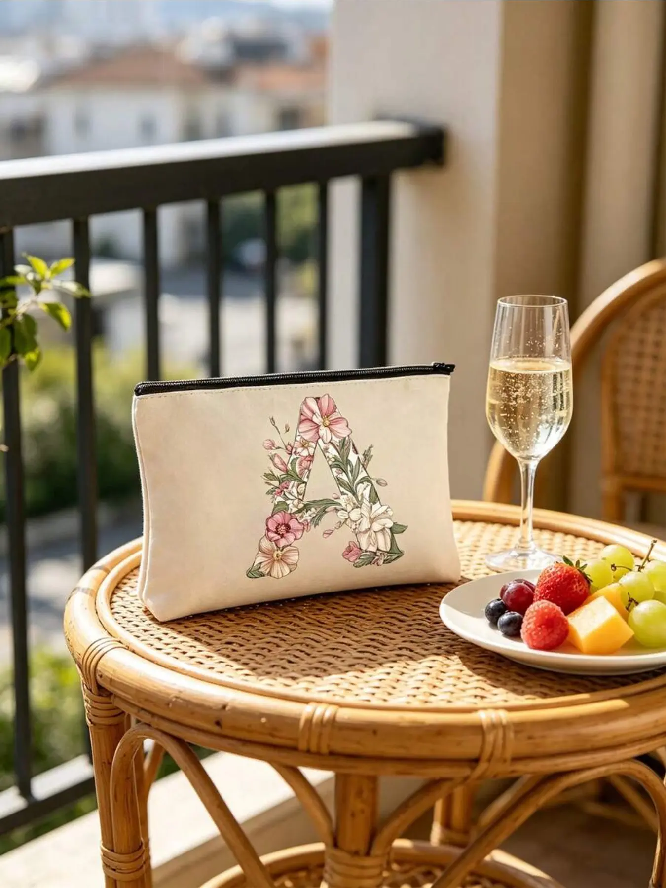 Personalized canvas makeup bag with floral A-Z letters. Zippered design stores cosmetics, skincare and small jewelry. Compact and portable for daily use, travel and school. Perfect gift for teachers, bridesmaids and special occasions.