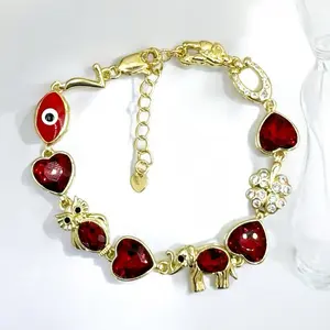 Good Luck Bracelet with Red Crystal Hearts Gold-Tone Finish 18k Gold Plated Elephant Horse Clover Owl Eye 7 Symbols Decorative Elements 7.5 inch with 2 inch Extension