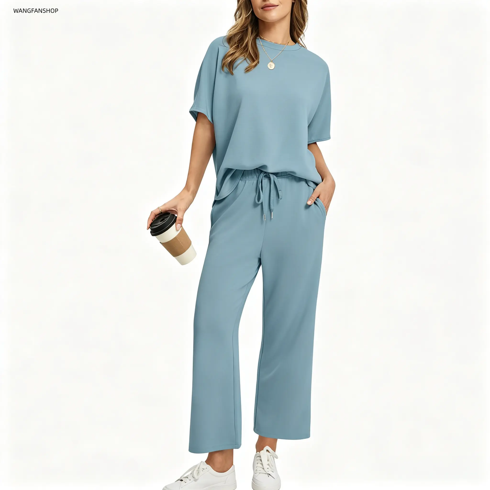 Women’s crew-neck two-piece loungewear set with cap sleeves—silky, soft, and breathable coordinated outfit featuring a loose top and drawstring wide-leg pants (9/10 length), suitable for summer travel, vacations, and everyday casual wear.