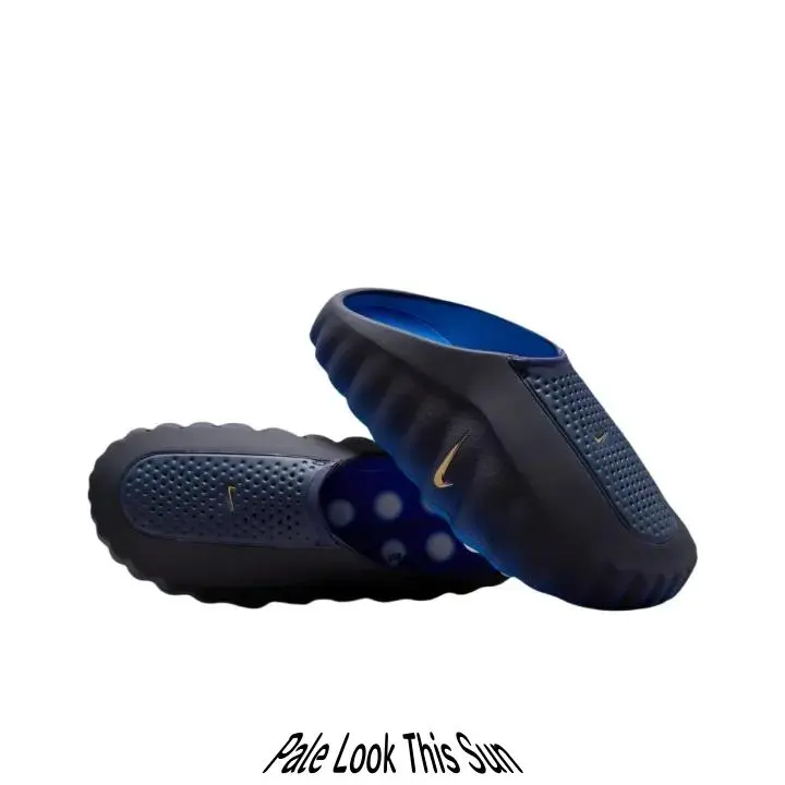 Streetwear casual slides crafted from smooth molded foam upper, sleek black contrasted by gradient blue rubber outsole, wavy rugged silhouette that elevates every dark-toned minimalist streetwear fit