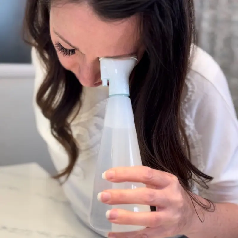 The LashBath a reusable fountain rinsing bottle ideal for cleaning eyelash extensions without touching and rubbing eyes. Sold as an empty bottle .  Ready to fill with clean warm water before use