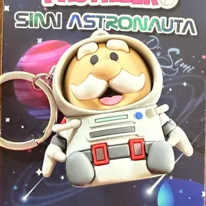 Dr. Simi Pastillero Simi Astronauta Keychain - Cute Character Design with Space Theme Background