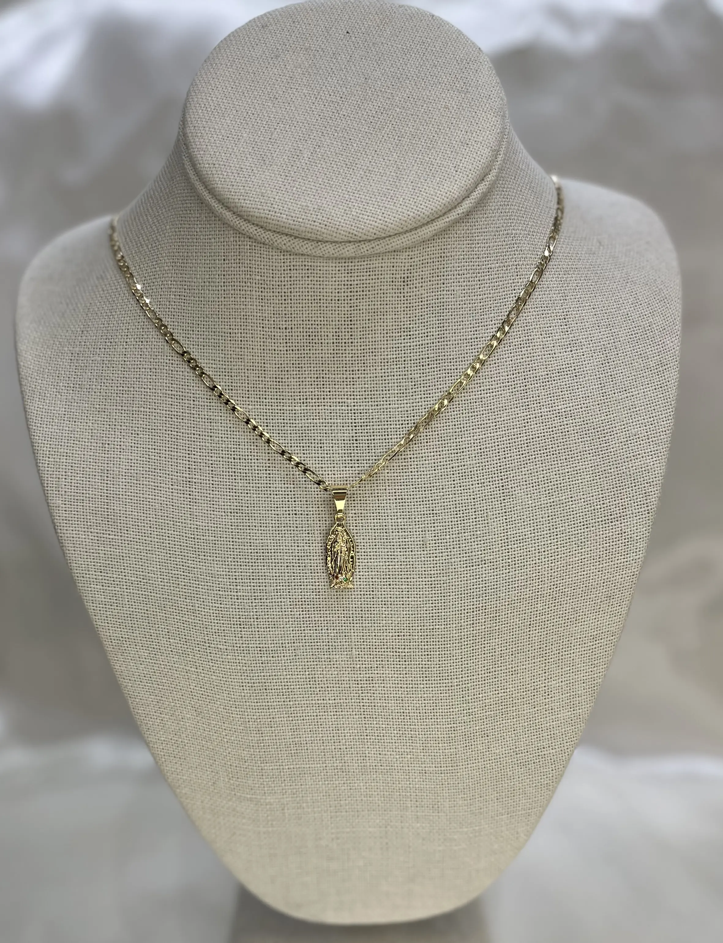 Gold Plated Virgen de Guadalupe Pendant paired with a Figaro Style Chain