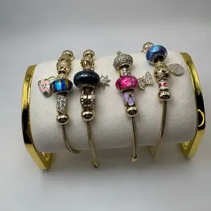 Dreamy Boho Glam Charm Bracelet Stack  Elevate your wrist game with this STUNNING gold snake chain bracelet loaded with handpicked statement charms!price is per unit.