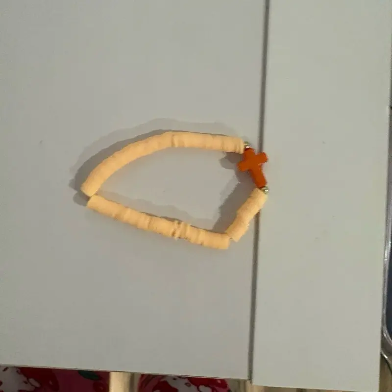 Tan cross bracelet