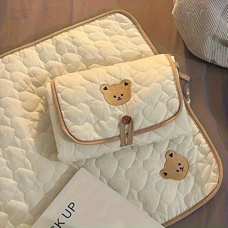 Cream Bear-Patterned Portable Diaper Changing Pad, Foldable and Breathable Polyester with Adjustable Strap for Travel, Secure Closure and Diaper Pouch, Diaper Bag With Changing Station