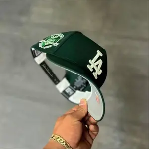 Los Angeles Dodgers New Era 9FORTY Snapback Baseball Cap – Dark Green Flat Brim Hat with White LA Logo & Anniversary Side Patch, MLB Streetwear Headwear