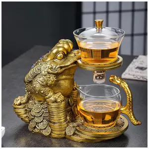 Creative Golden Cicada Shaped Teapot Magnetic Tea Pot Semi Automatic Glass Teapot Lazy Kungfu Drip Teapot Magnetic Attraction Water Rotating Cover Bowl Suitable for Home/Office Reception Tea Set