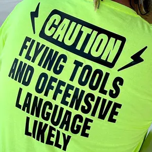 HI VIZ SAFETY GRAPHIC T-SHIRT. SAFETY ORANGE & SAFETY GREEN! “CAUTION FLYING TOOLS ABD OFFENSIVE LANGUAGE LIKELY”