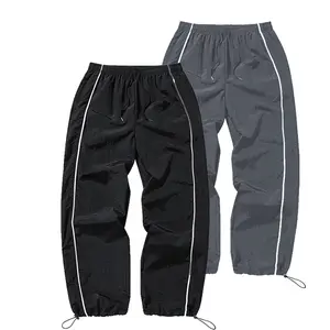 2-Pack Men’s Lightweight Windproof Joggers with Reflective Stripes, Elastic Waist Drawstring, Casual Street Style Cuffed Long Pants