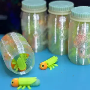 Jar of glowing fidget firefly’s