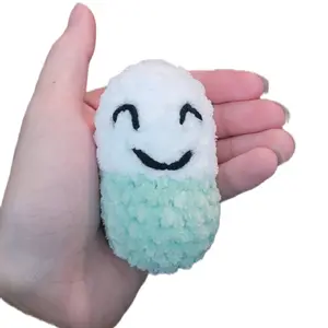 Mini Crocheted Chill Pill Stuffies Adorable Smiling Design in Mint Green and White Perfect for Decor or Cuddles