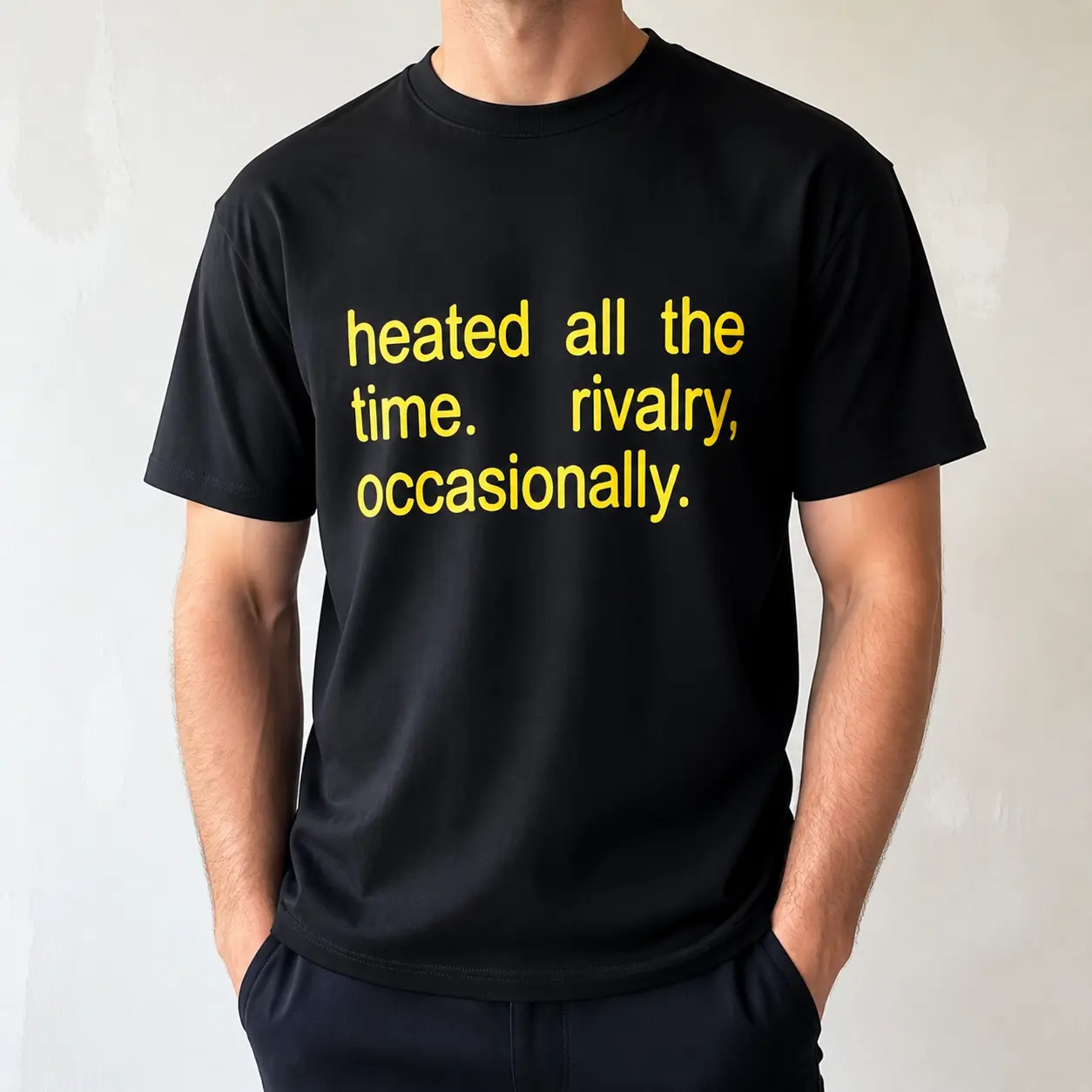 "Heated All The Time, Rivalry Occasionally" Graphic T-Shirt - Funny Sports Meme Statement Top - Competitive Game Day Aesthetic Apparel - Soft Breathable Graphic Shirt - Unique Professional Detail Crew Neck Tee