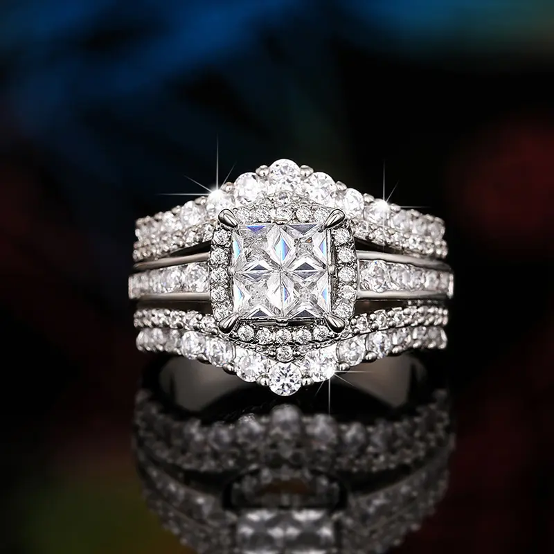 A double-layered cubic zirconia ring, a square-framed crown ring, a super sparkly and realistic two-in-one design, fashionable jewelry, a wife's accessory, or a couple's engagement ring. daisy cluster wedding wax synthetic moissanite elongated shank witch