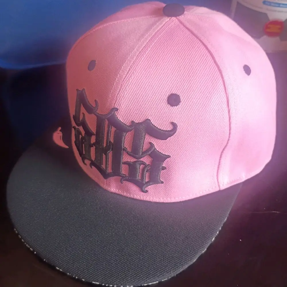 pink with black highlights burque 505 hat