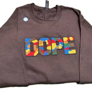 PATCHWORKZ Custom Patched Sweatshirts - Colorful DOPE Design on Brown Fabric